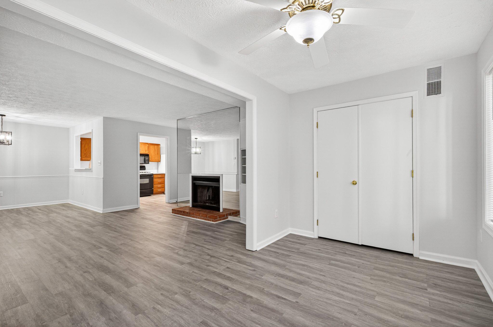 2281 Hunter's Run Drive, Unit 2281 Reston, VA 20191 - Photo 13 of 25 View from Sunroom to Living Room/Kitchen