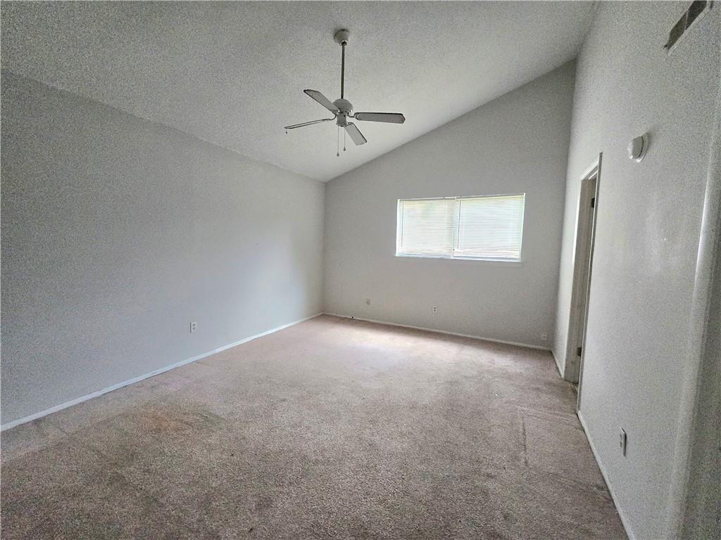 4701 Flat Shoals Road, Unit 67D Union City, GA 30291 - Photo 9 of 13 an empty room with windows and fan