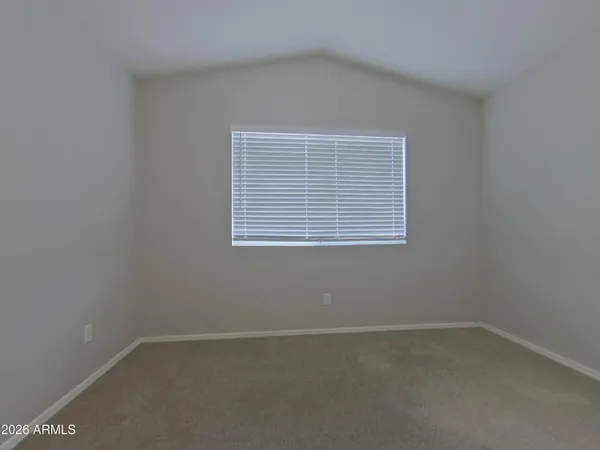 a kitchen with a sink cabinets and stainless steel appliances