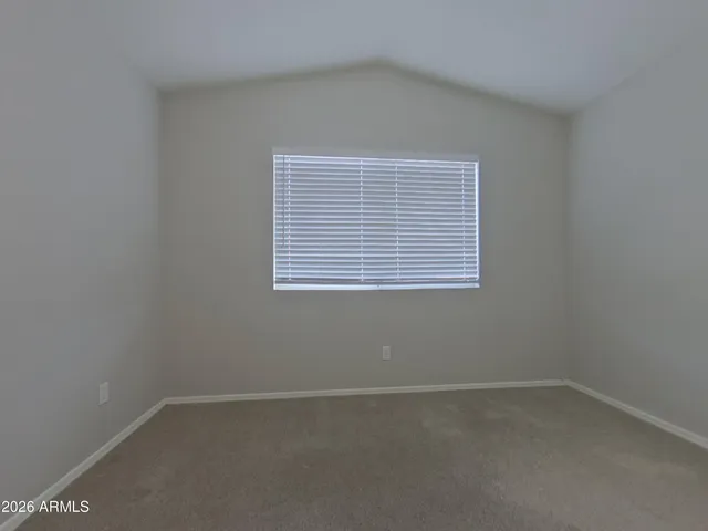 a kitchen with a sink cabinets and stainless steel appliances