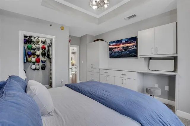 a bedroom with a bed and furniture