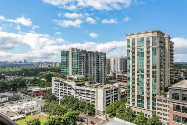 a view of a city with tall buildings