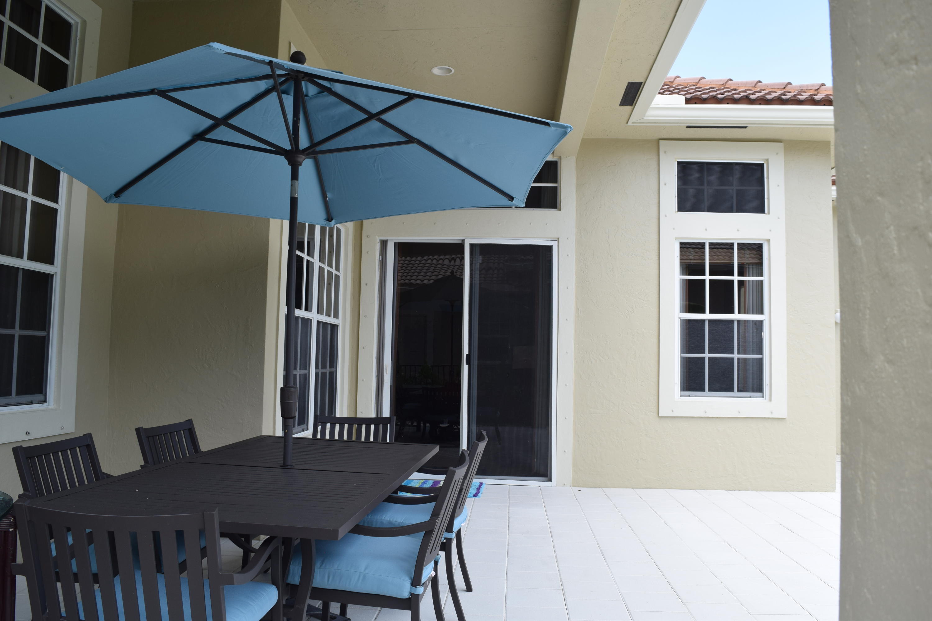 132 Via Isabela Jupiter, FL 33458 - Photo 24 of 27 a table that has a table and chairs in it