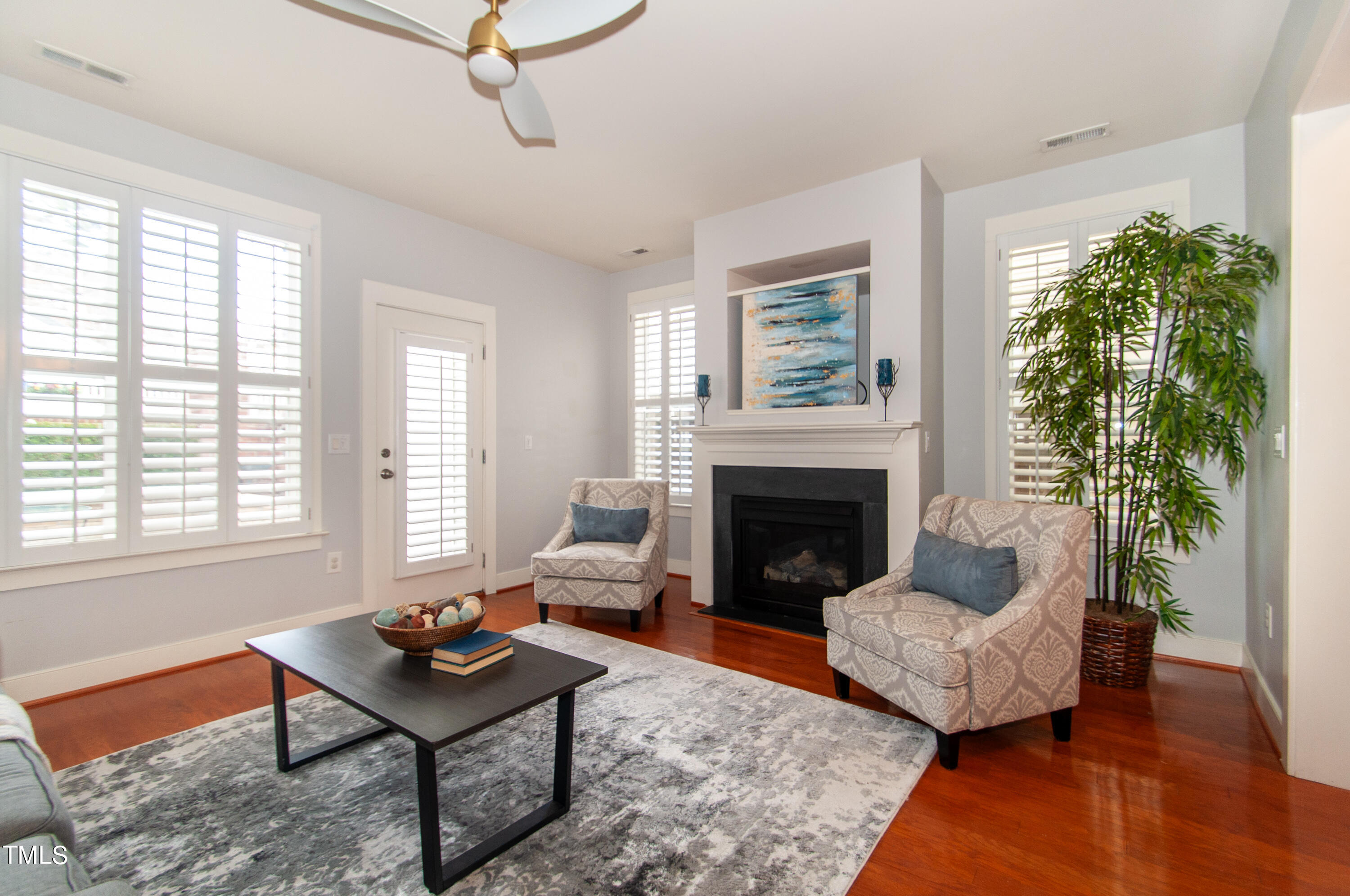 10946 Peppermill Drive Raleigh, NC 27614 - Photo 16 of 53 a living room with furniture and a fireplace