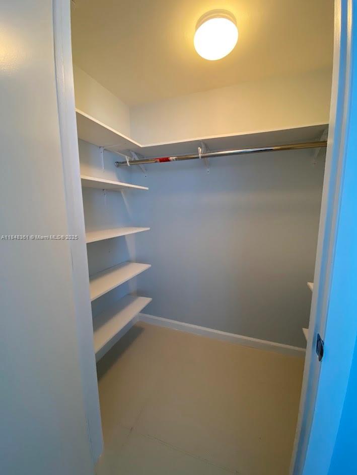475 Brickell Avenue, Unit 4409 Miami, FL 33131 - Photo 20 of 37 a view of an empty walk in closet