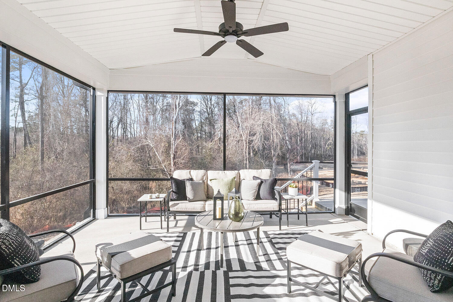 8120 Andrea Lane Raleigh, NC 27613 - Photo 9 of 25 a living room with furniture and a floor to ceiling window