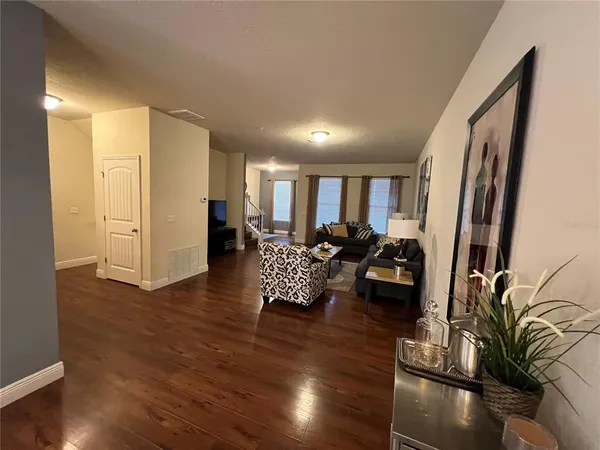 a bedroom with a bed and a mirror