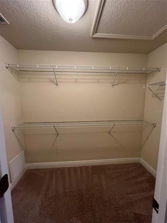 10742 Sunset Ridge Lane Orlando, FL 32832 - Photo 32 of 40 a view of a room with racks on the wall