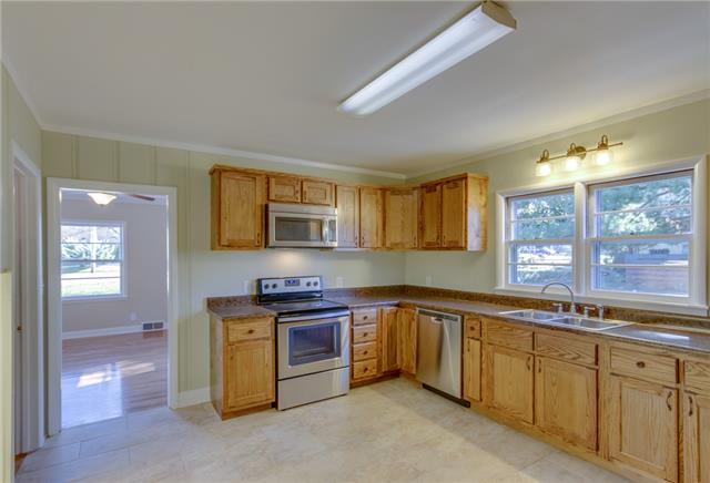 107 North Main Street Springfield, TN 37172 - Photo 4 of 12 New Kitchen Cabinets - New Stainless Steel Appliances - Tile Flooring