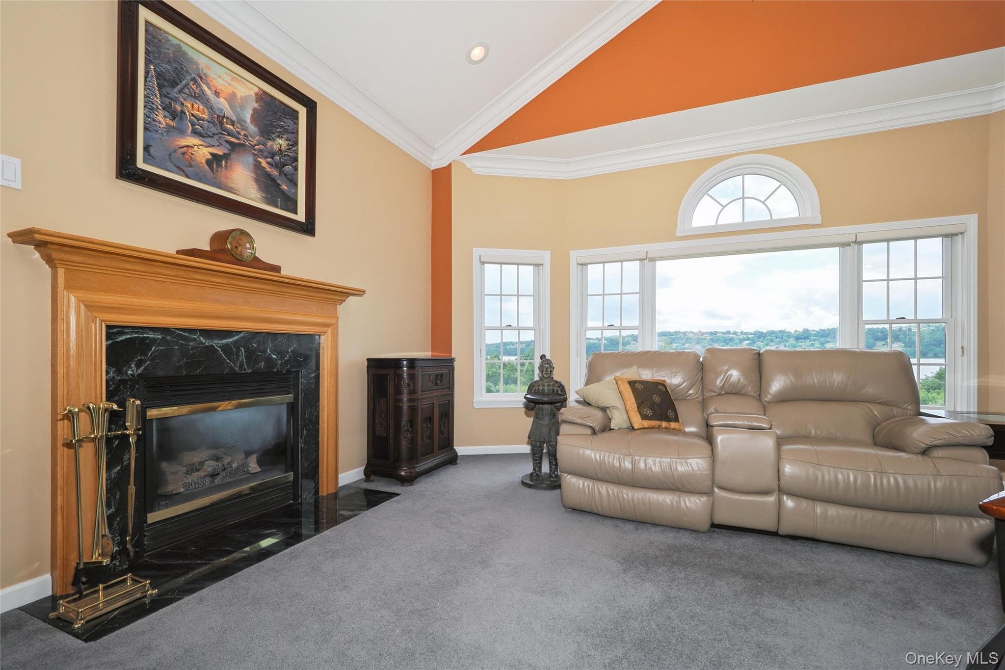 241 Old Castle Point Road Wappingers Falls, NY 12590 - Photo 12 of 19 Gas Fireplace, cathedral ceiling, full wall of windows for unobstructed River views