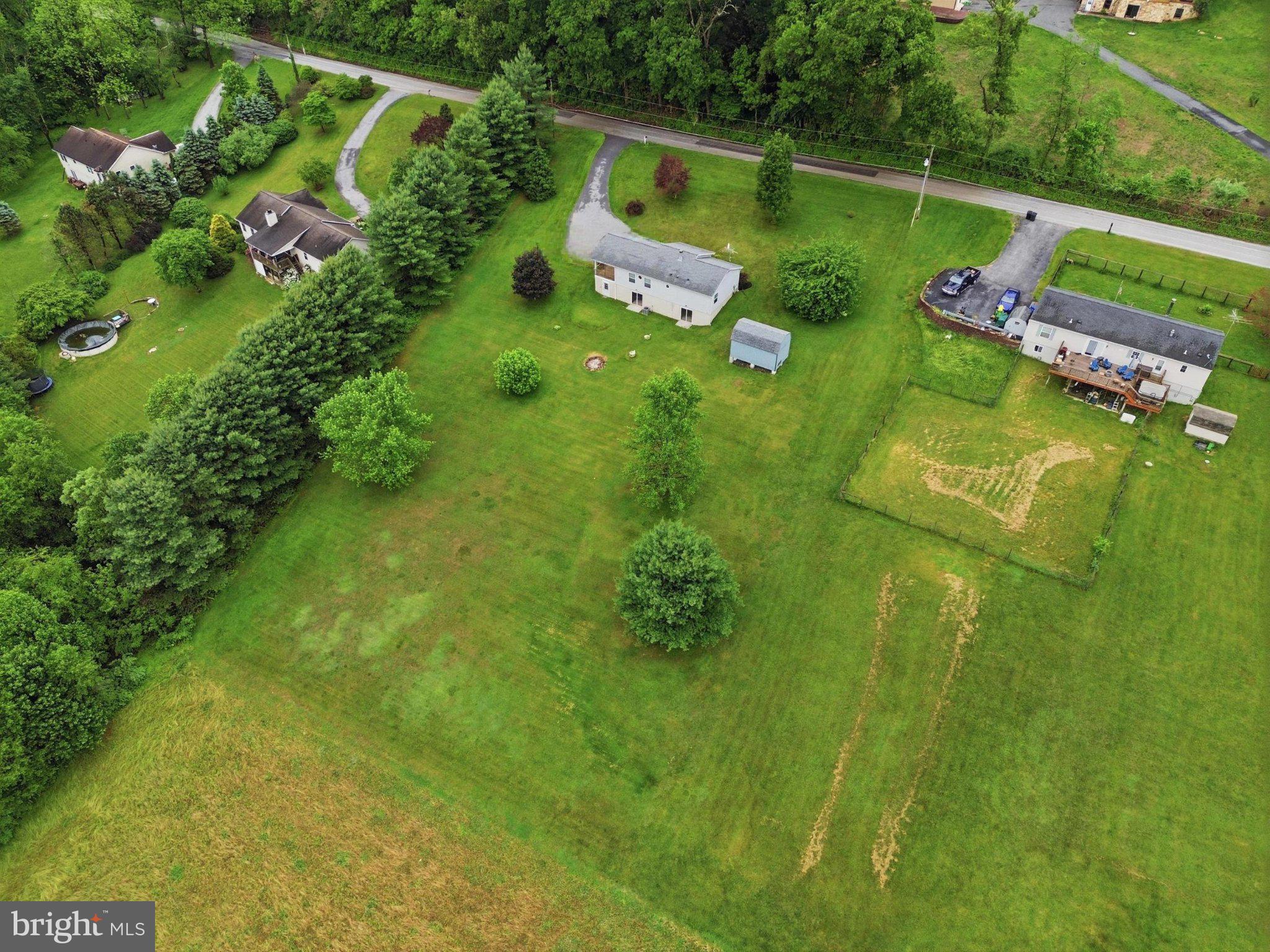 491 Garvine Mill Road Fawn Grove, PA 17321 - Photo 38 of 47 a view of a lake with a yard