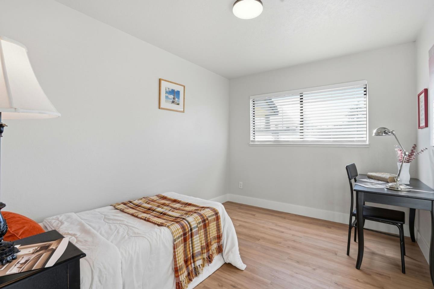 221 Pinon Avenue Pinole, CA 94564 - Photo 16 of 31 a bedroom with a bed and a desk