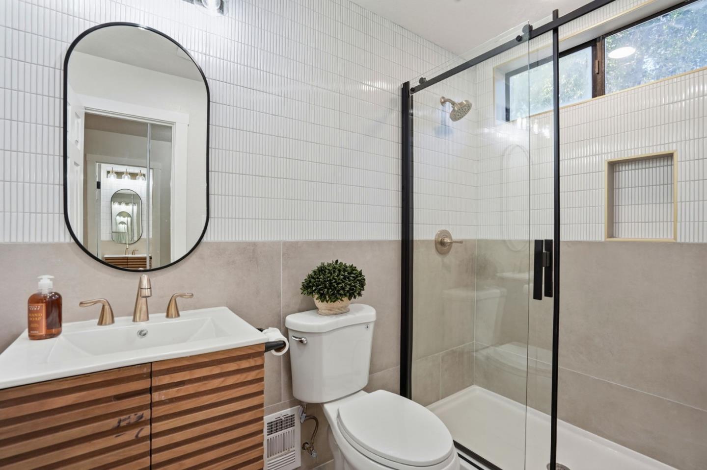 221 Pinon Avenue Pinole, CA 94564 - Photo 23 of 31 a bathroom with a sink toilet and shower