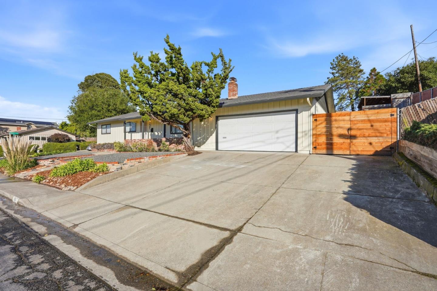 221 Pinon Avenue Pinole, CA 94564 - Photo 3 of 31 a view of a house with a street