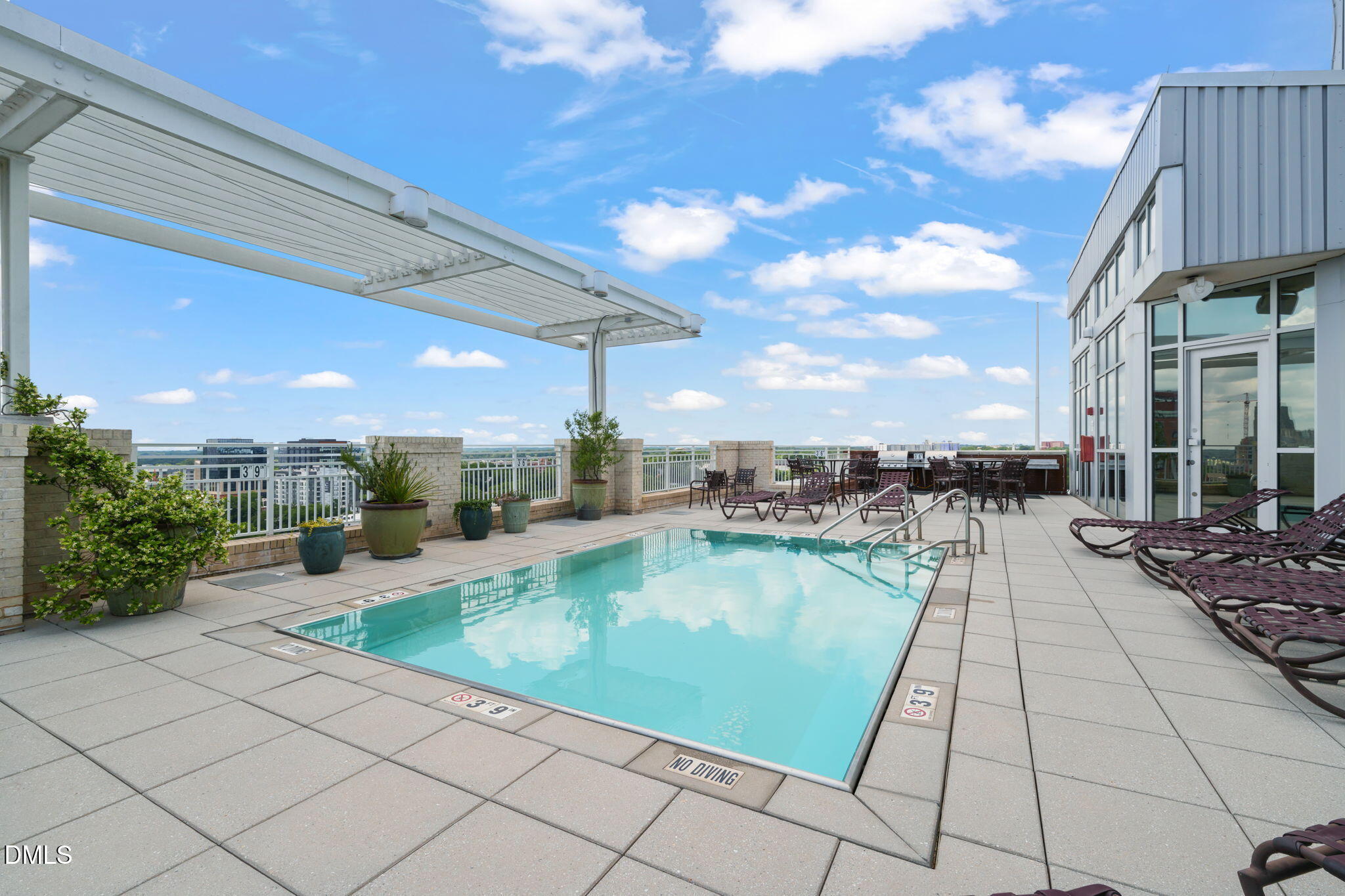 400 West North Street, Unit 1218 Raleigh, NC 27603 - Photo 29 of 41 a view of a patio with swimming pool