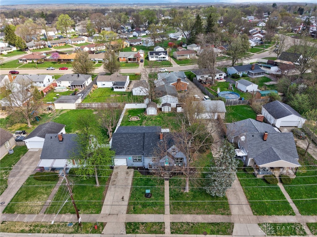 3301 Wildwood Road Middletown, OH 45042 - Photo 59 of 68 An aerial view showcases a vibrant suburban neighborhood with charming homes and lush green landscapes.