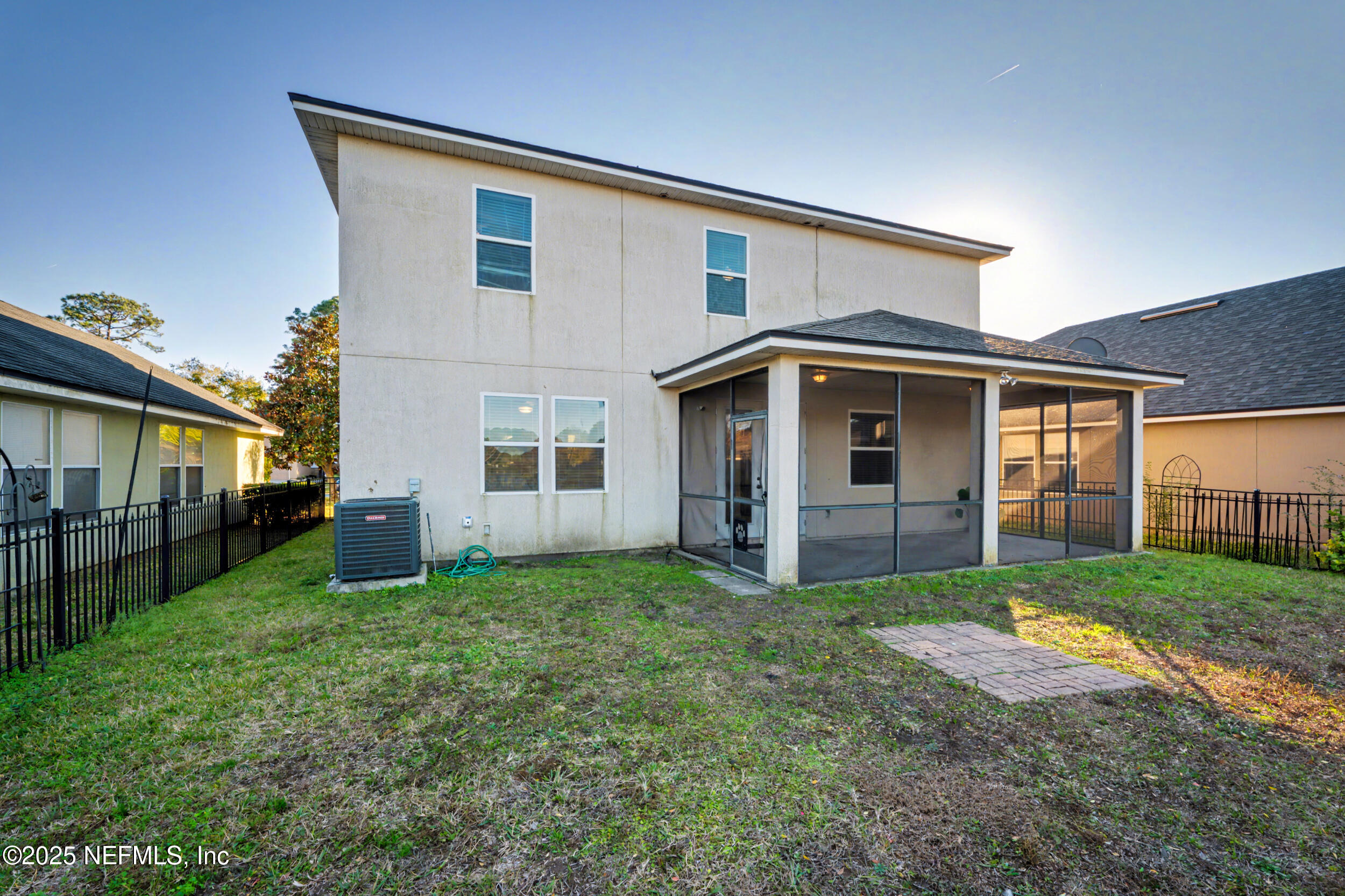 13697 Goodson Place Jacksonville, FL 32226 - Photo 26 of 28 a view of a yard in front of a house with plants and large tree
