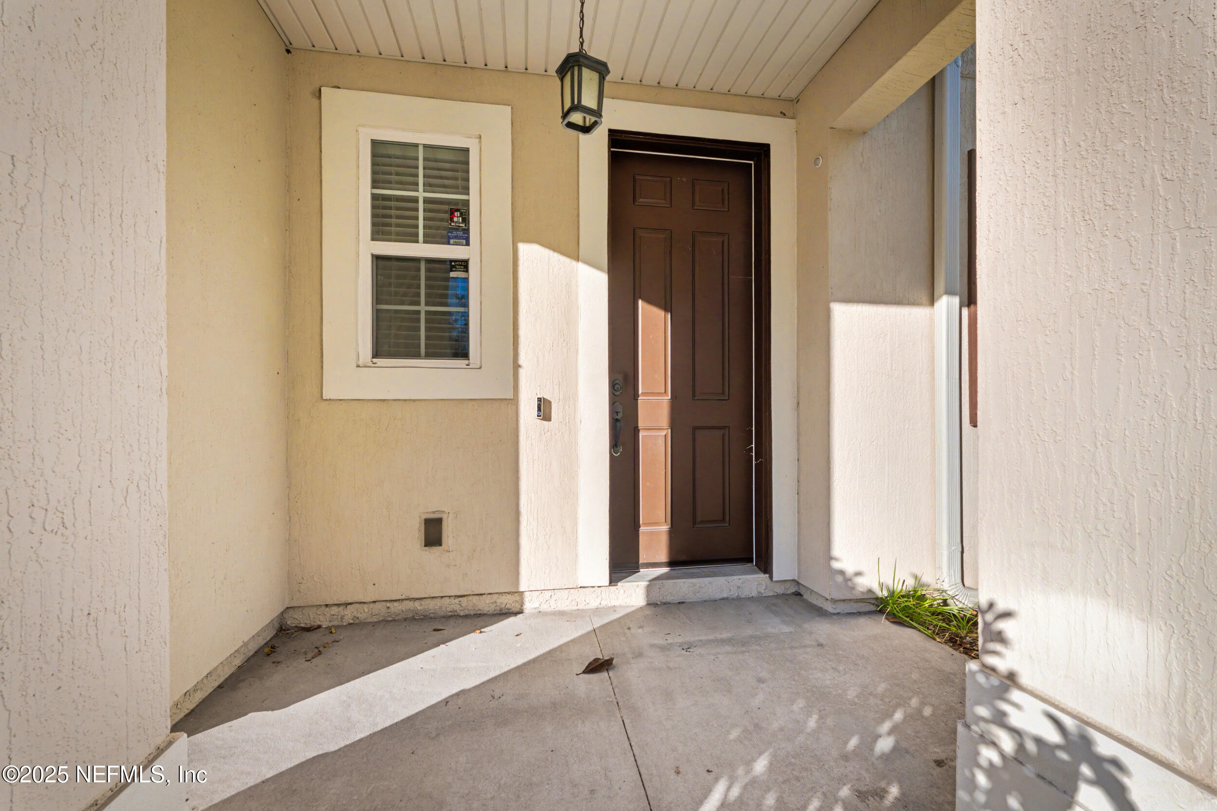 13697 Goodson Place Jacksonville, FL 32226 - Photo 3 of 28 an empty room with windows