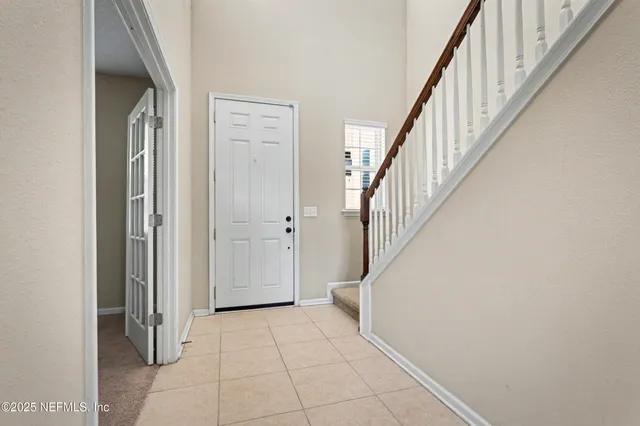 a view of an entryway with staircase