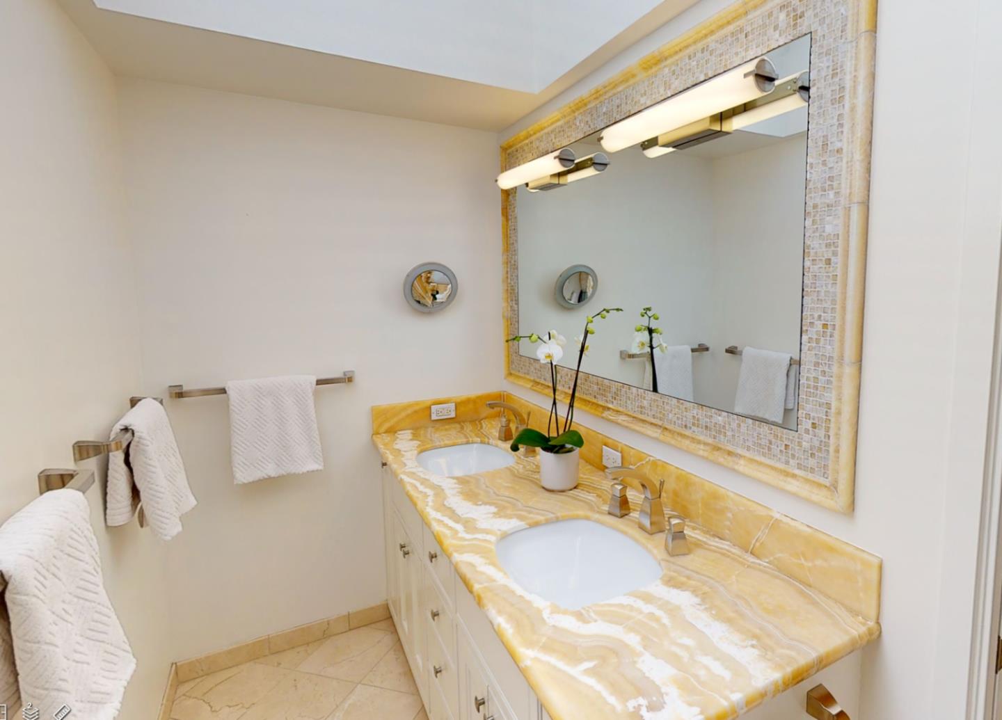 3413 Ridgemont Drive Mountain View, CA 94040 - Photo 7 of 8 a bathroom with a granite countertop sink and a mirror