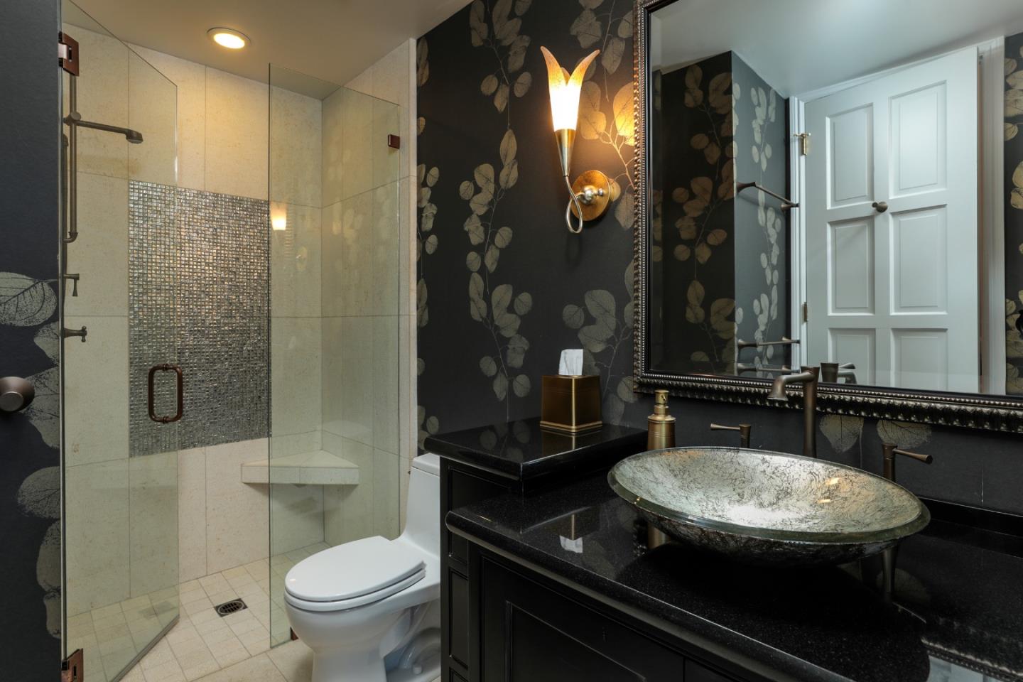 3413 Ridgemont Drive Mountain View, CA 94040 - Photo 8 of 8 a bathroom with a granite countertop sink a toilet a mirror and shower