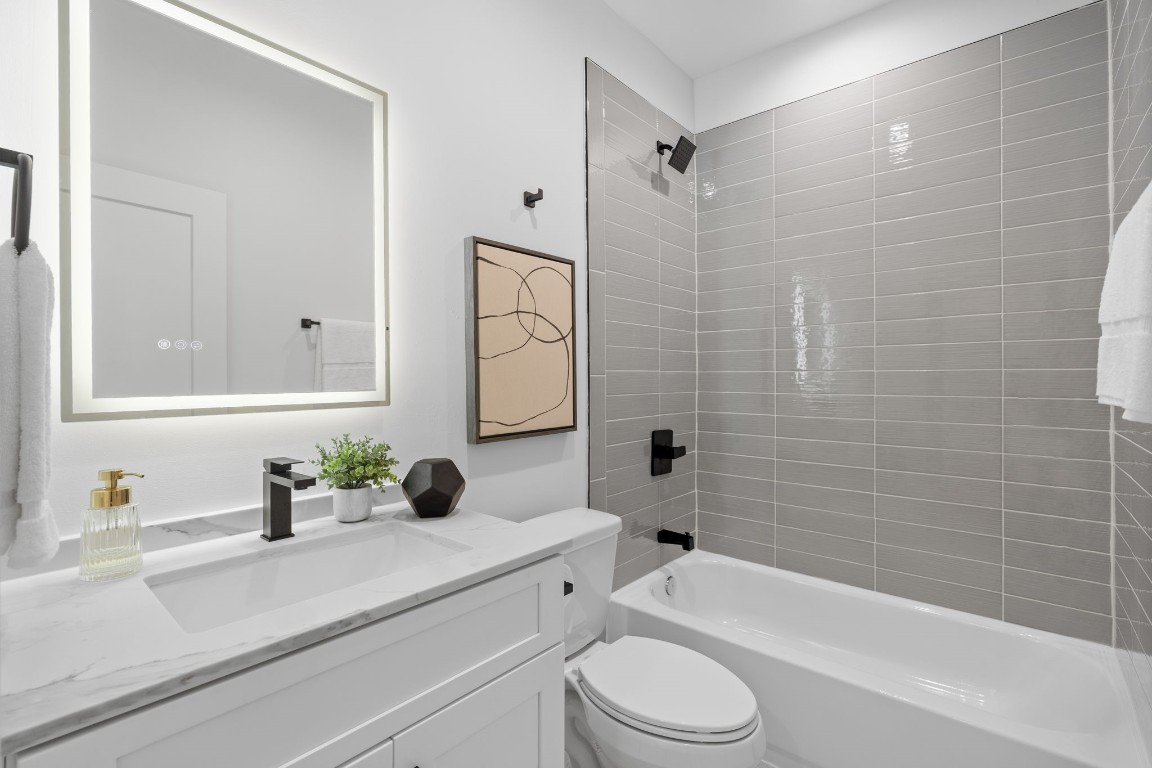 4754 Martin Hill Street Houston, TX 77018 - Photo 9 of 48 First floor bathroom with LED Touch dimmable lighed mirror.