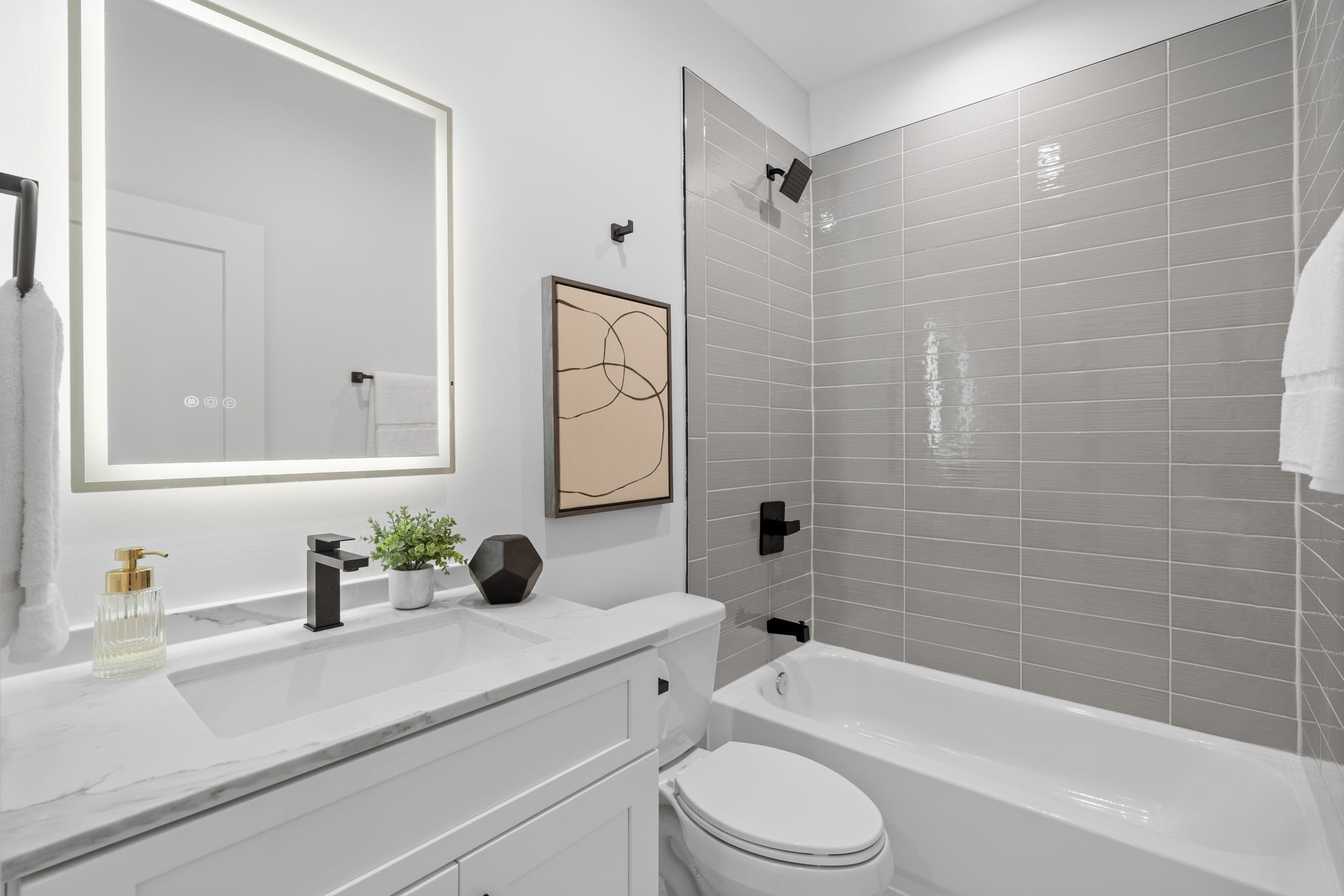 4754 Martin Hill Street Houston, TX 77018 - Photo 9 of 48 First floor bathroom with LED Touch dimmable lighed mirror.