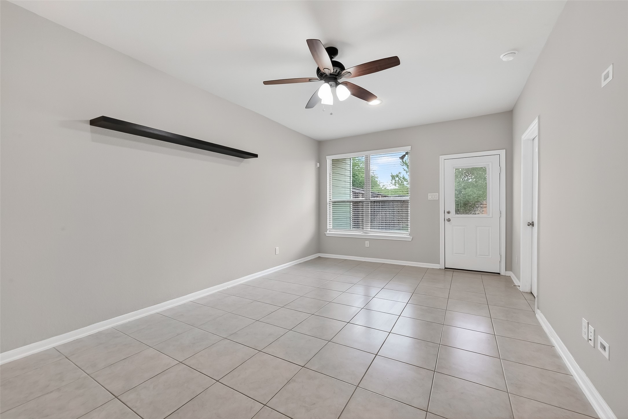 16226 Rattlesnake Run Trail Cypress, TX 77433 - Photo 16 of 29 a view of an empty room with a window