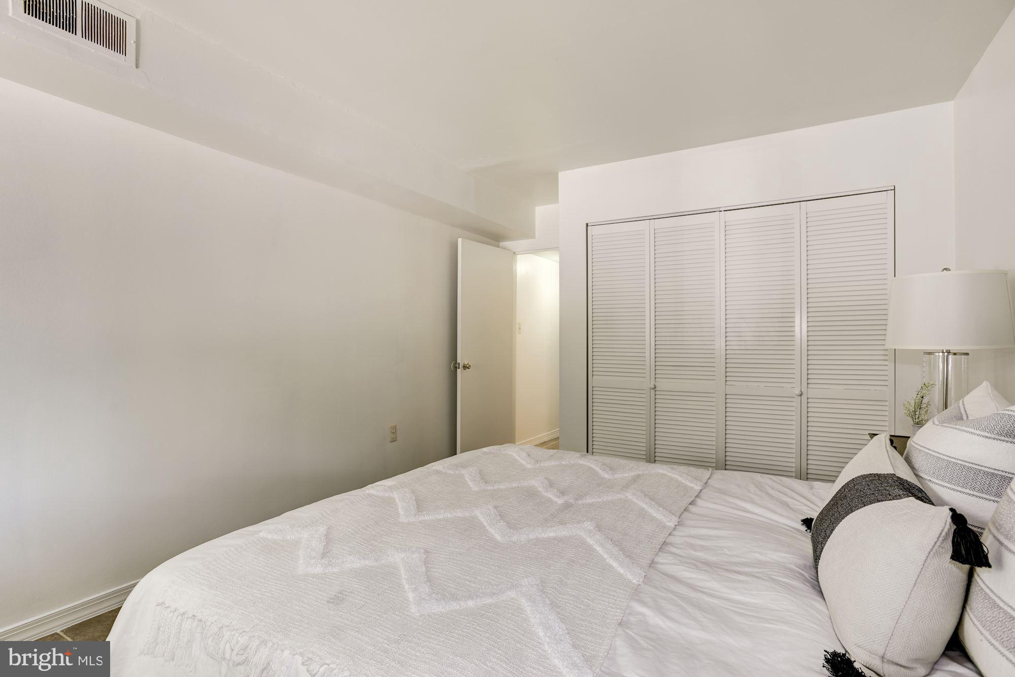 1400 Northgate Square, Unit 2A Reston, VA 20190 - Photo 20 of 27 Bedroom with Spacious Closet