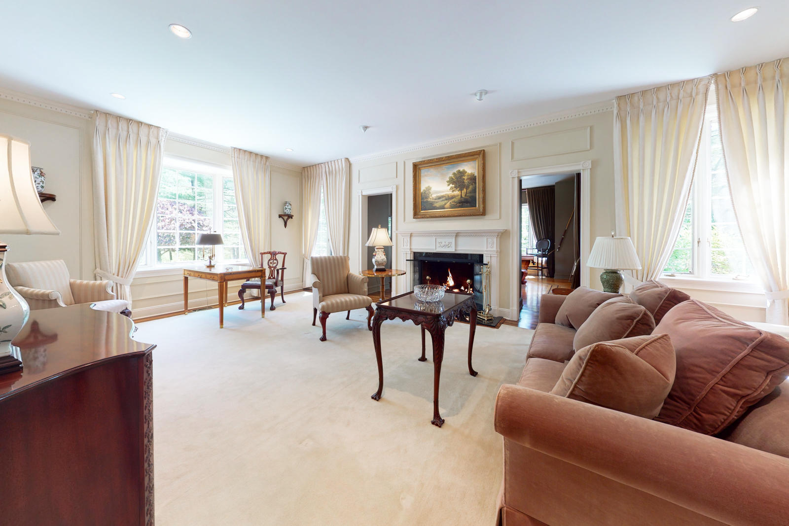 731 Hollow Tree Ridge Road Darien, CT 06820 - Photo 11 of 43 a living room with furniture and a fireplace