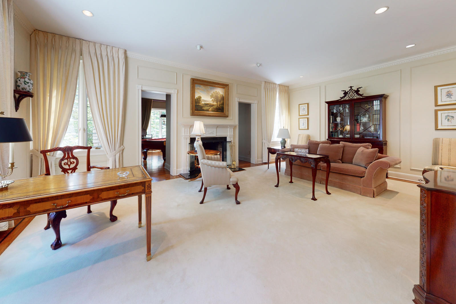 731 Hollow Tree Ridge Road Darien, CT 06820 - Photo 12 of 43 a living room with furniture and a fireplace