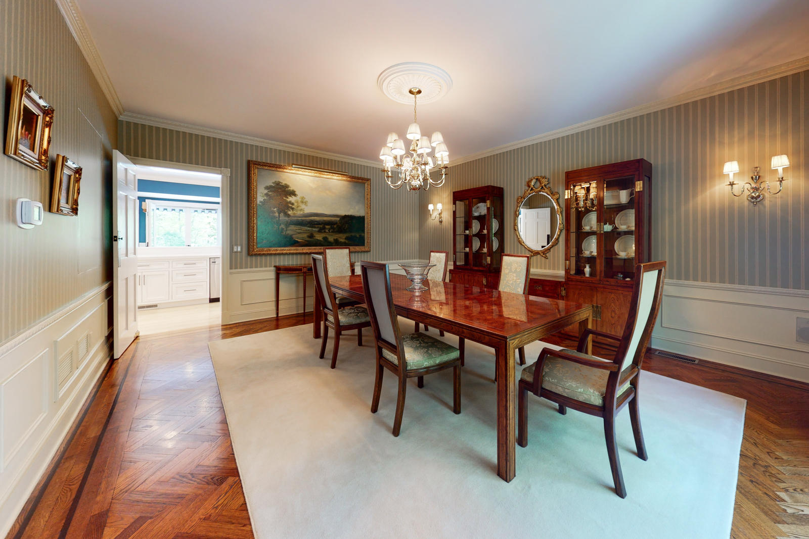 731 Hollow Tree Ridge Road Darien, CT 06820 - Photo 16 of 43 a view of a dining room with furniture and chandelier