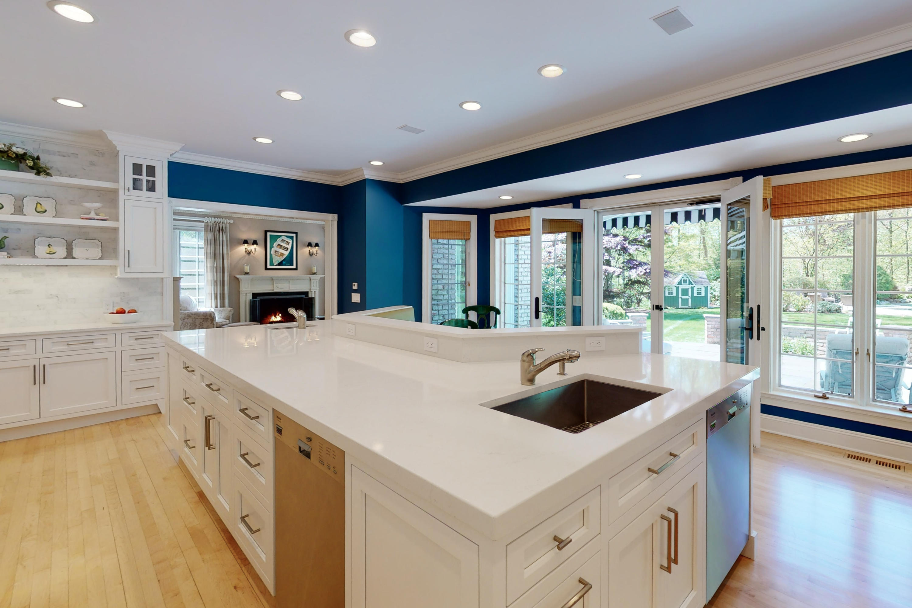731 Hollow Tree Ridge Road Darien, CT 06820 - Photo 17 of 43 a large white kitchen with a large window