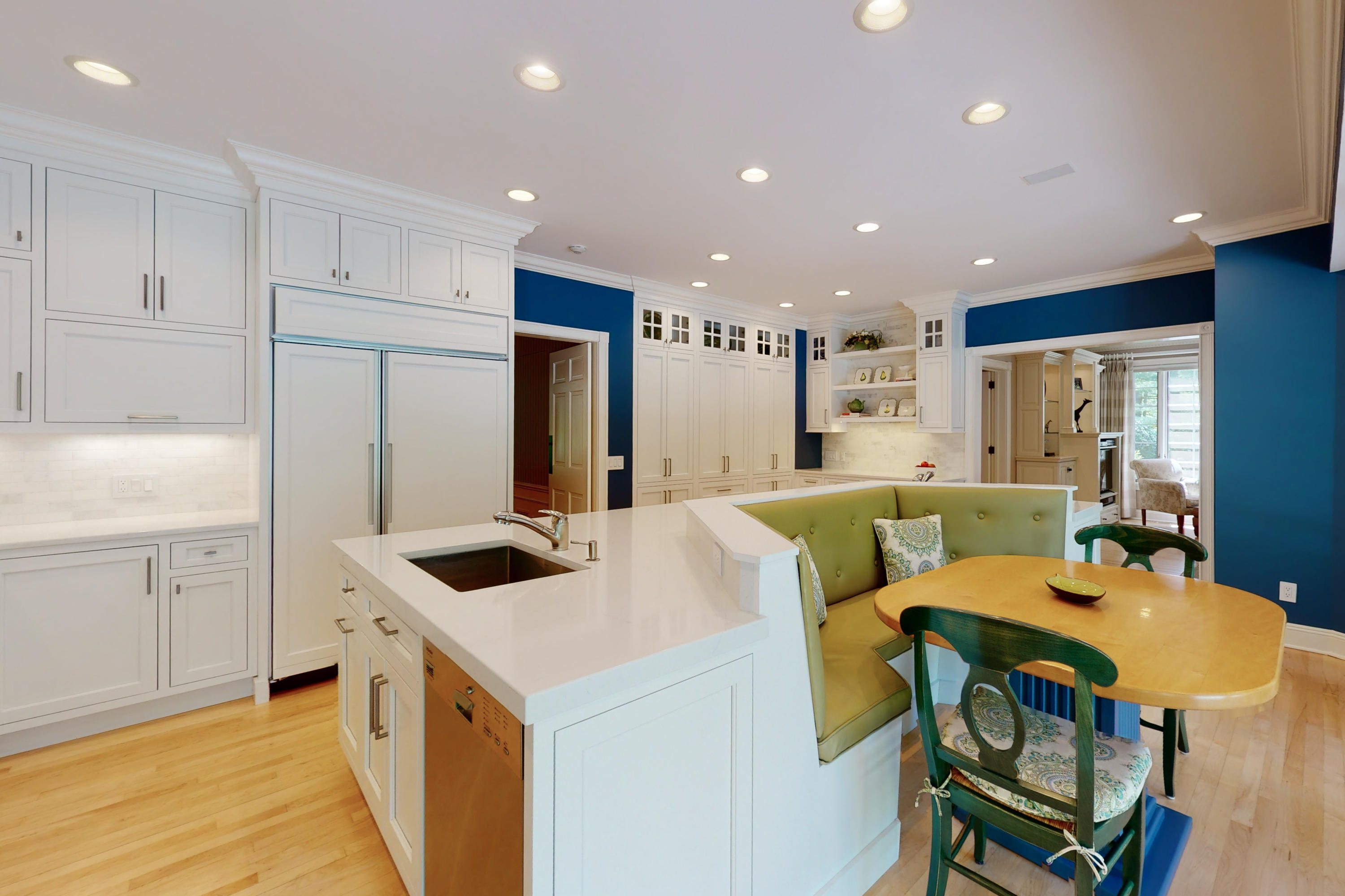 731 Hollow Tree Ridge Road Darien, CT 06820 - Photo 20 of 43 a kitchen with kitchen island a appliances dining table and chairs