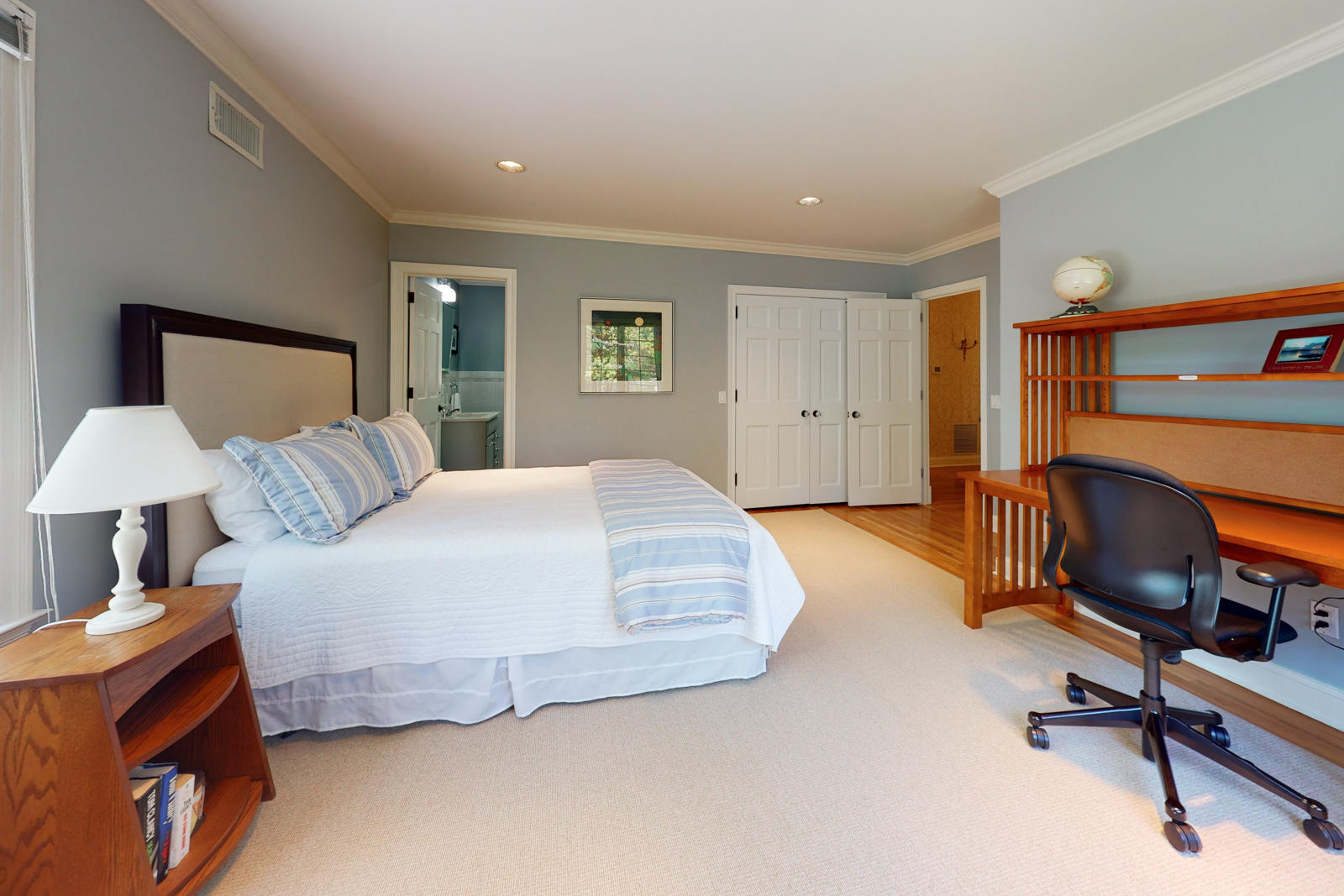 731 Hollow Tree Ridge Road Darien, CT 06820 - Photo 29 of 43 a bedroom with a bed and a chair