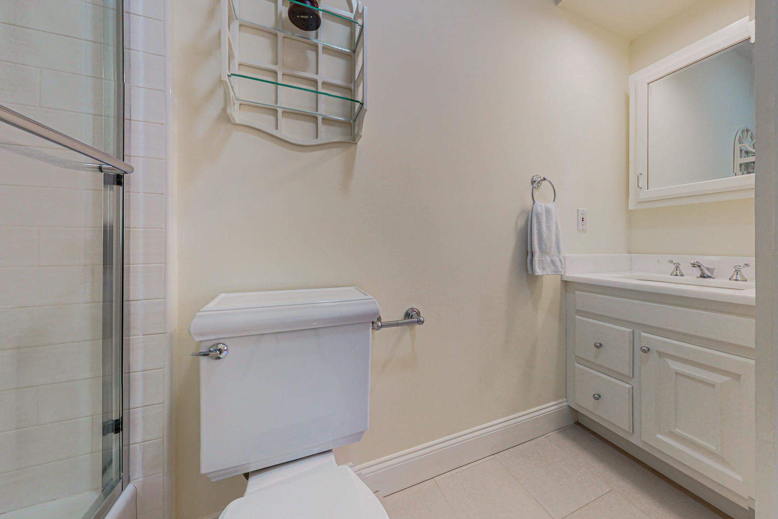 731 Hollow Tree Ridge Road Darien, CT 06820 - Photo 33 of 43 a bathroom with a sink a toilet and a mirror