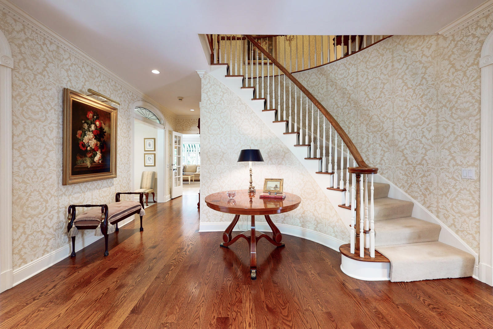 731 Hollow Tree Ridge Road Darien, CT 06820 - Photo 9 of 43 a view of entryway dining room and hall with wooden floor