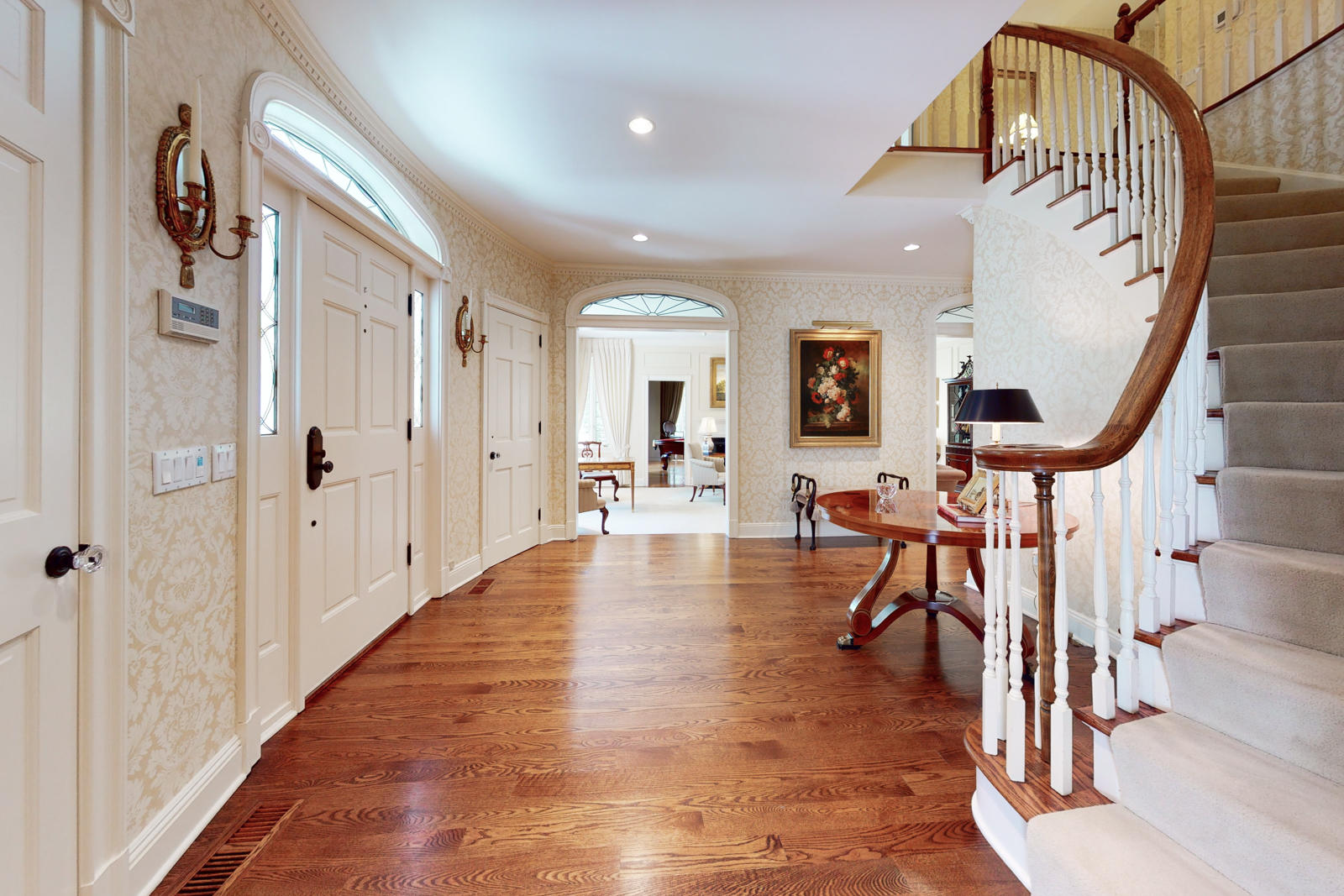 731 Hollow Tree Ridge Road Darien, CT 06820 - Photo 10 of 43 a view of a hallway with wooden floor windows and entryway