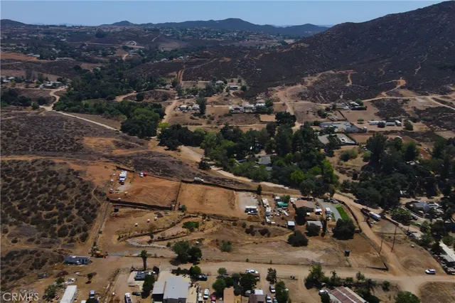 an aerial view of residential house with outdoor space