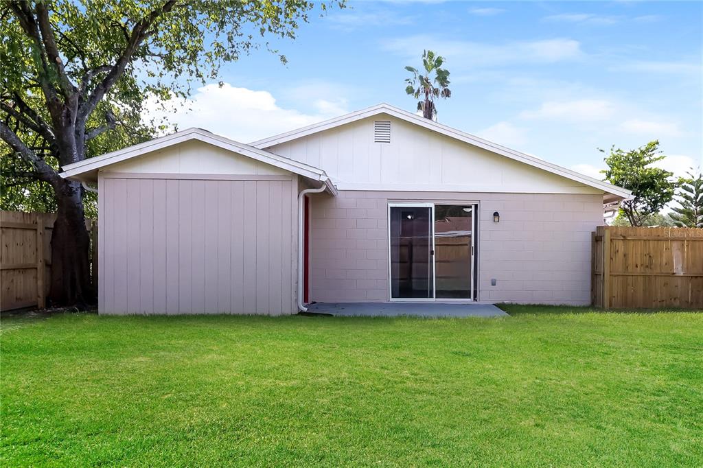 4560 Chamber Court Spring Hill, FL 34609 - Photo 15 of 16 a front view of house with yard and green space