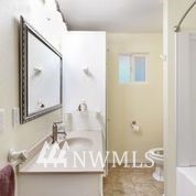 1240 Kenoyer Drive Bellingham, WA 98229 - Photo 11 of 22 a bathroom with a sink and a mirror