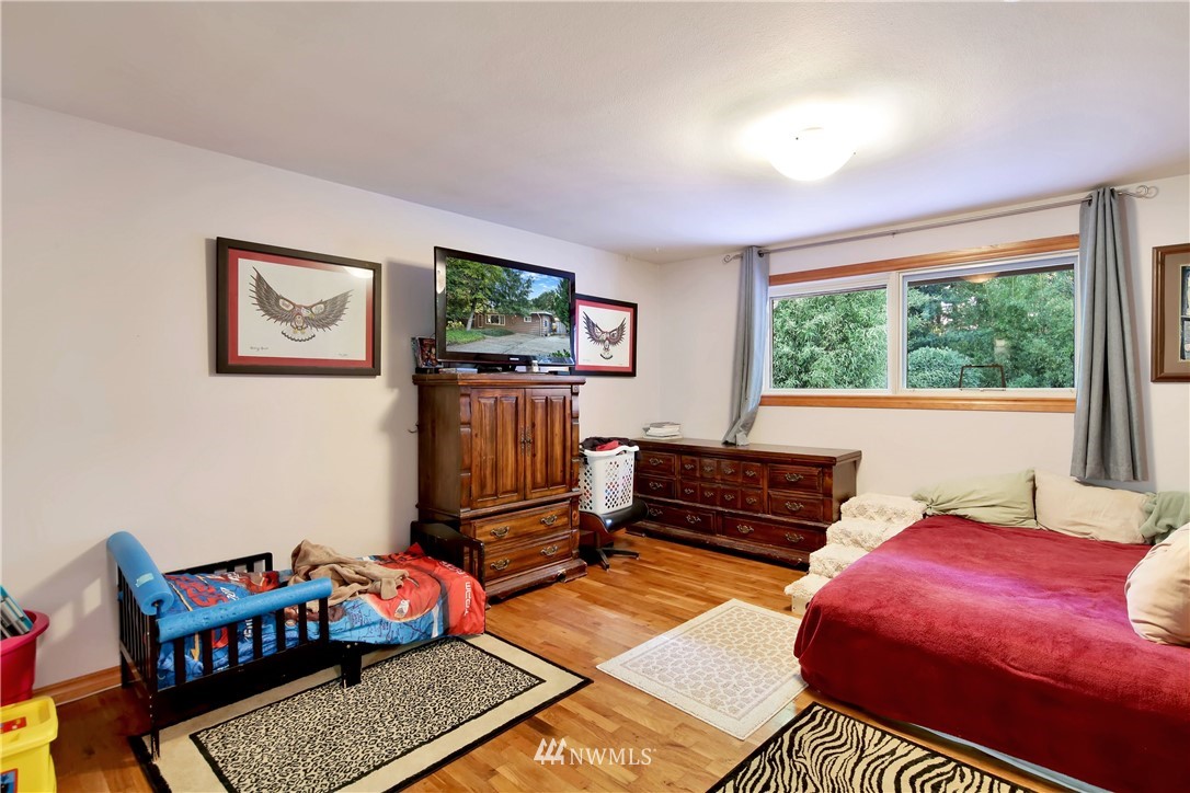 1240 Kenoyer Drive Bellingham, WA 98229 - Photo 9 of 22 a bedroom with furniture and a window