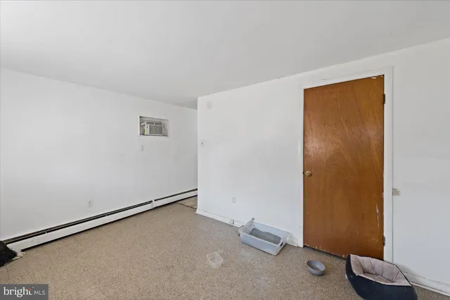 an empty room with a workbench