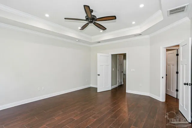 a bathroom with a sink double vanity granite and a mirror