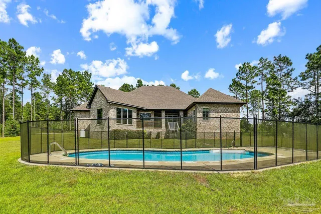 a view of a porch with wooden floor