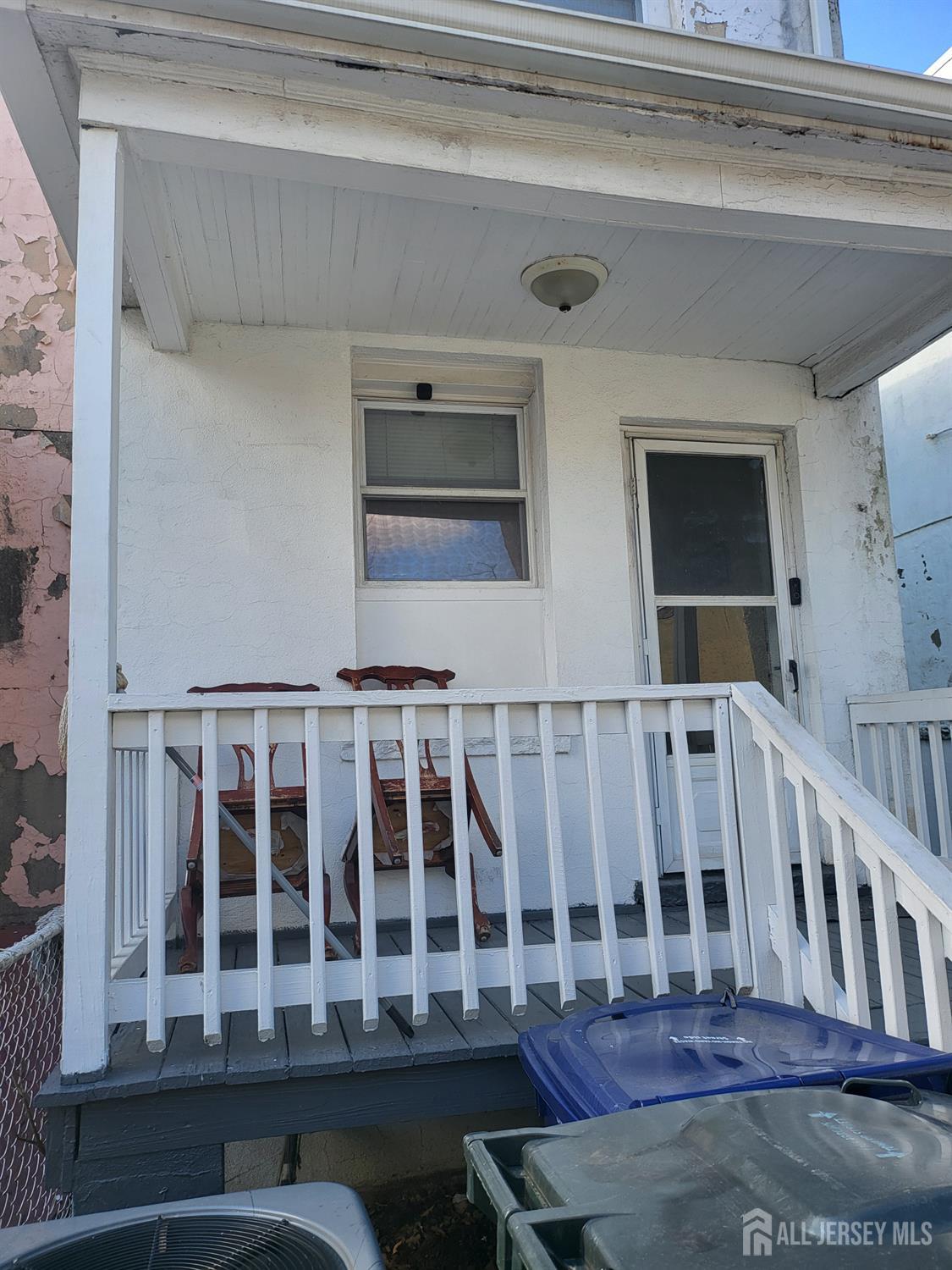 54 State Street Perth Amboy, NJ 08861 - Photo 22 of 35 a view of a house with wooden deck