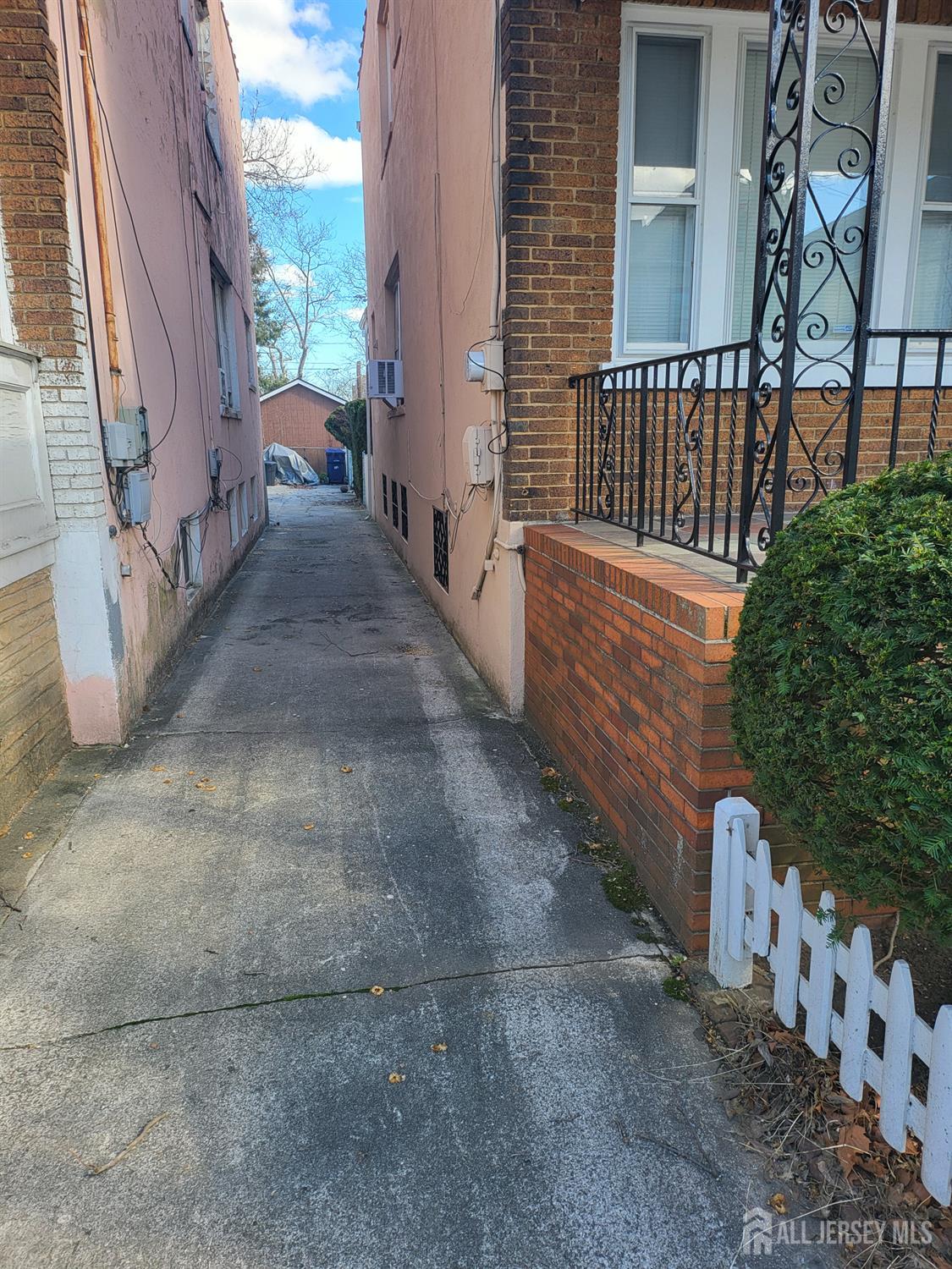 54 State Street Perth Amboy, NJ 08861 - Photo 25 of 35 a view of a pathway of a house