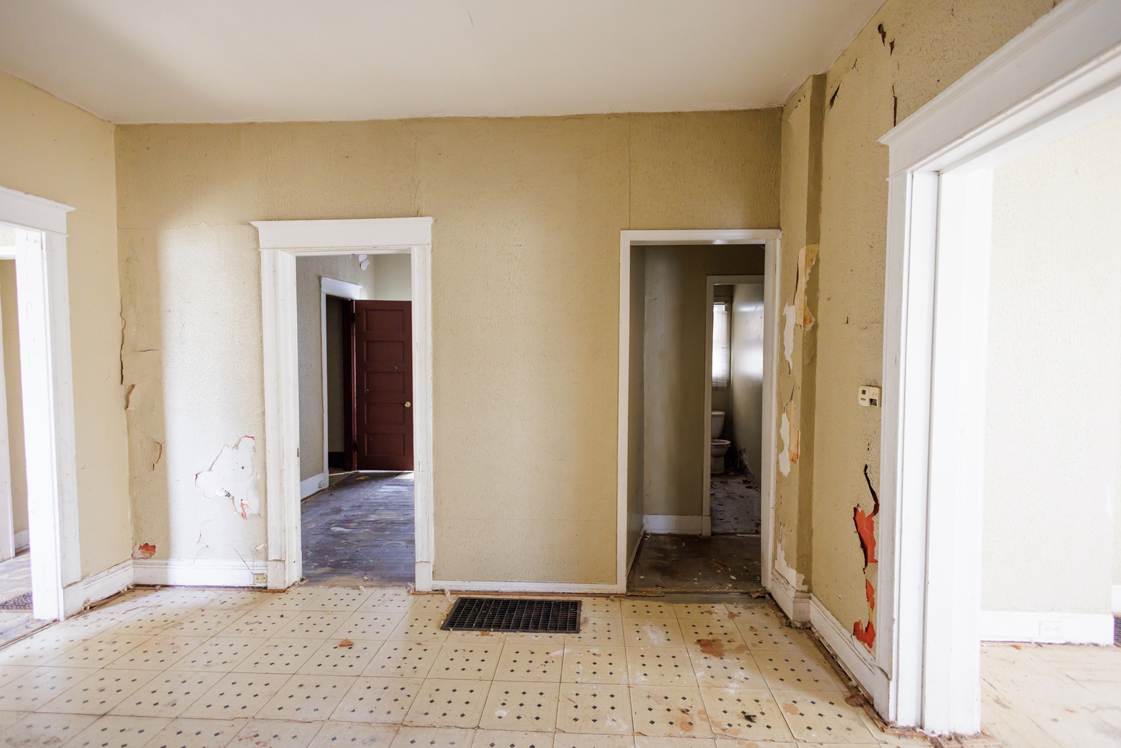 427 South Chicago Avenue Kankakee, IL 60901 - Photo 20 of 60 a view of a hallway with wooden floor and a bathroom