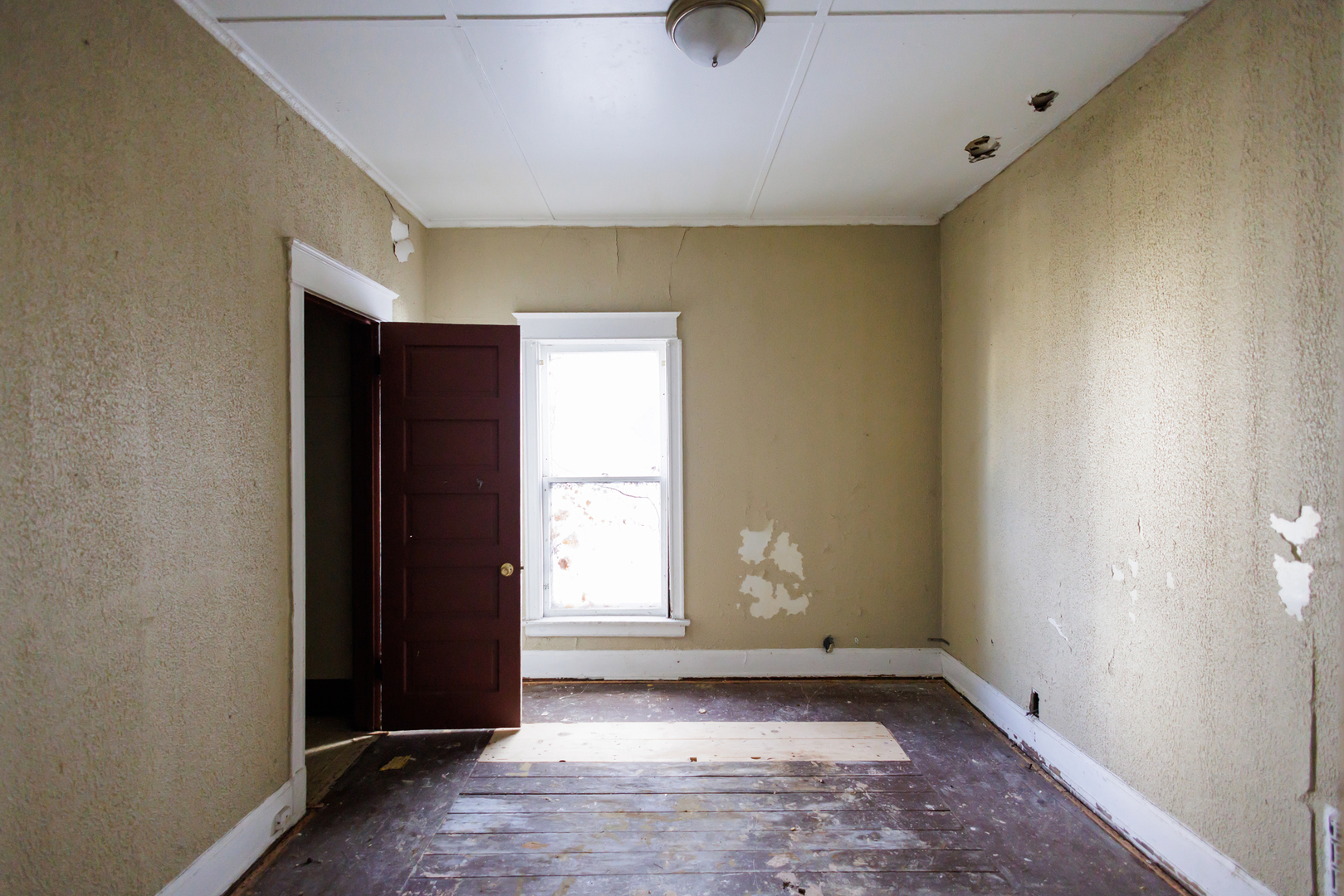 427 South Chicago Avenue Kankakee, IL 60901 - Photo 22 of 60 a view of an empty room with a window