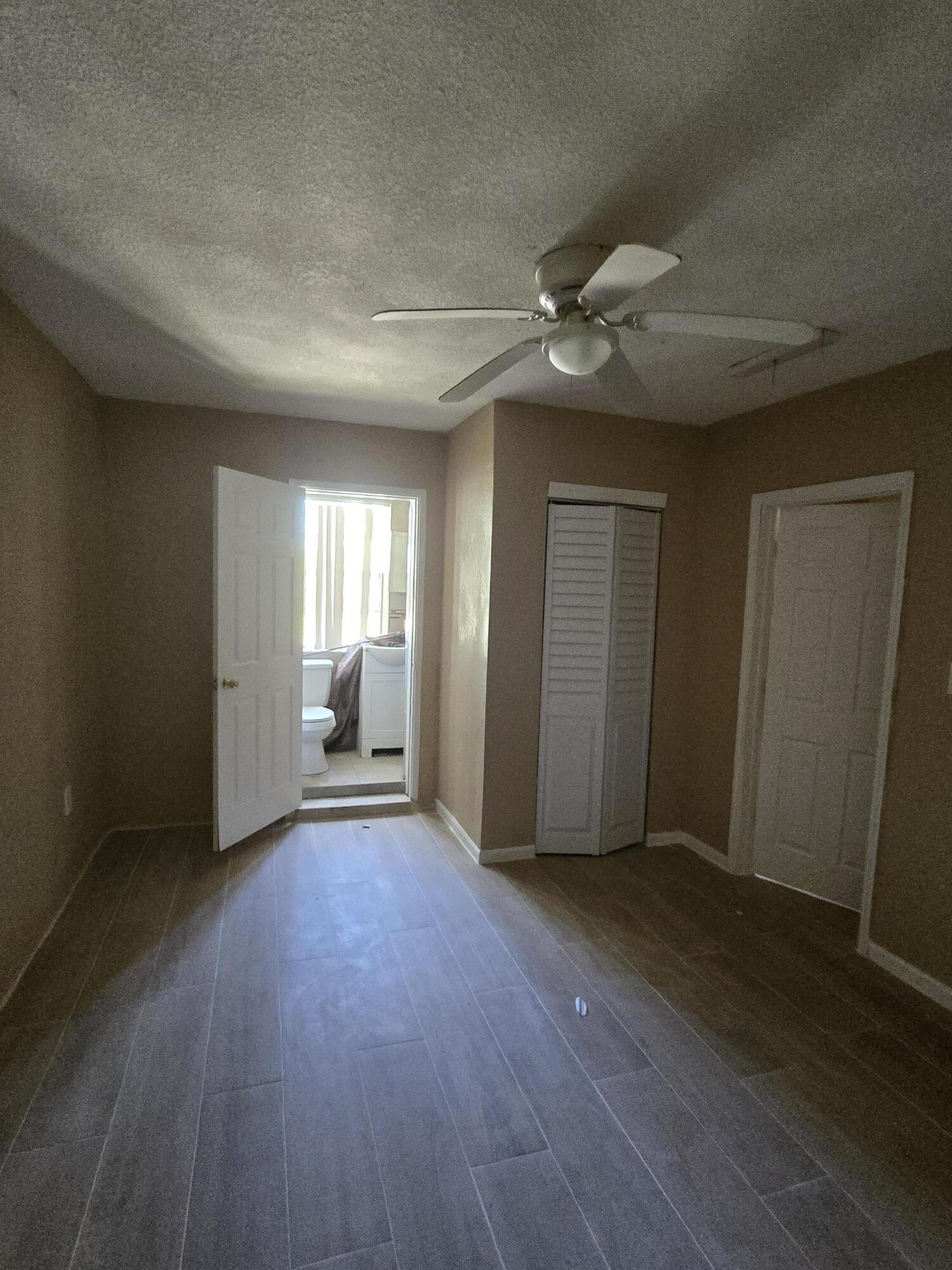815 Silver Beach Road Lake Park, FL 33403 - Photo 4 of 9 Extra room and bathroom